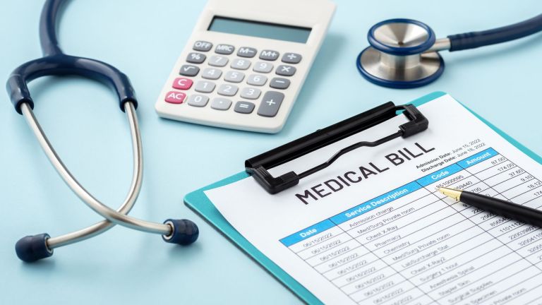 outsourcing-medical-billing-stethoscope-calculator-and-clipboard-with-medical-bill